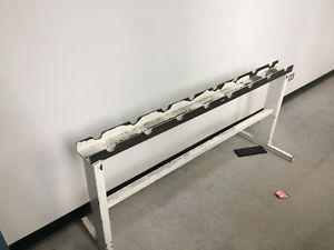 Solid metal dumbell rack