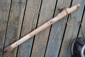 carved wood flute