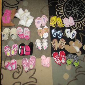 21 pair of baby shoes (newborn-size 2)