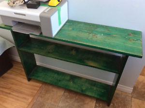 Homemade green shelf, round side table