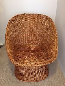 Two antique wicker chairs
