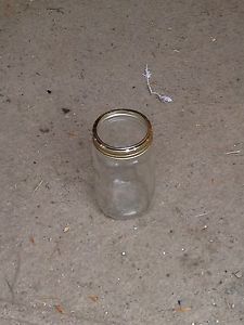 Approx 48 wide mouth Quart jars,rack,tings,canner