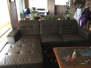 Brown leather sectional couch