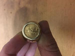 Heavey 14kt and 22kt gold men's coin ring.