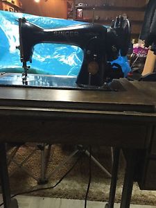 Singer sewing machine. $. Firm price