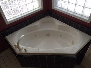 Used jacuzzi tub with faucet