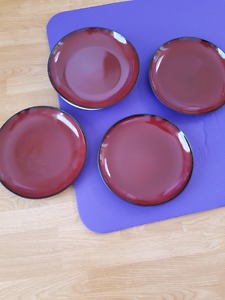 Four brand new plates for sale