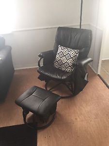 Nice black rocking, reclining chair and ottoman