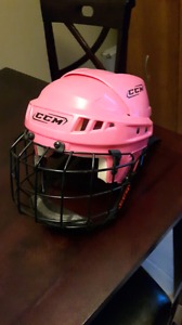 Pink CCM helmet