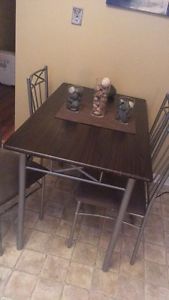 Table and four chairs & wine canvas art!