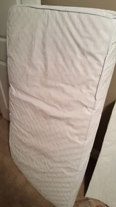 clean crib mattress