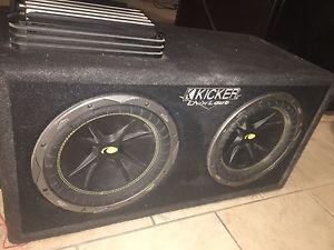 2 10 inch KICKER subwoofers enclosed with ALPINE AMP