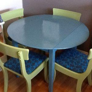 Blue wood table w/4 green chairs with fabric seats