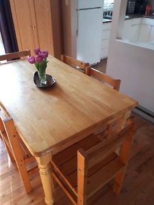 Pine Table and 7 chairs for sale.