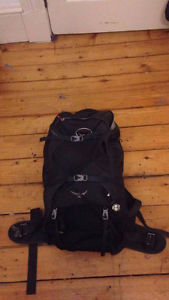 lightly used Volcanic Grey Osprey 55 Gallon travel backpack