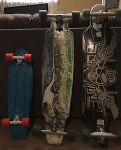 2 sector 9 longboards and a penny board
