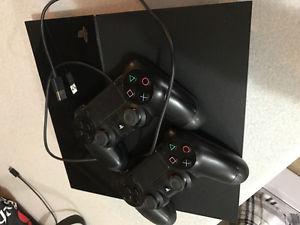 Playstaion 4 and two controllers