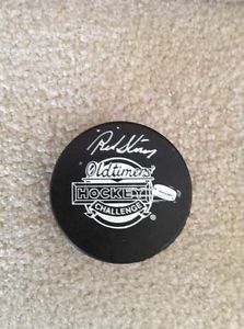Red Story Autographed Puck