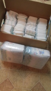 Size 3 diapers, large box and half over 150 diapers. $20