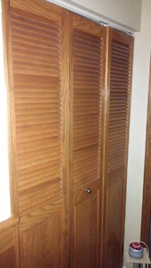 Solid wood (oak) of one set of bi-fold door and one single