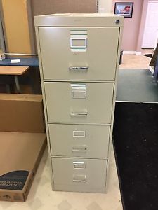 Two 4 drawer file cabinets
