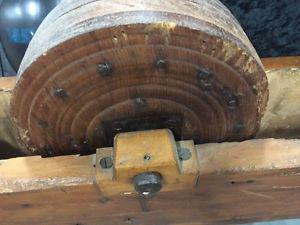 Antique wooden gear box, leather working wheel