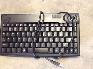 Keyboard with built in mouse ball