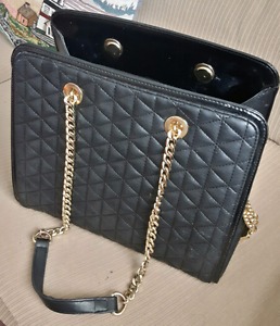 Black and gold bebe purse