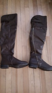 Knee high brown boots. Size 9. Never worn. l