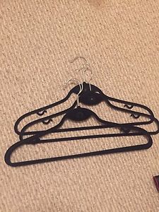 Moving sale: 20 black good quality hangers for $5.