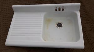 Old porcline sink with drain counter
