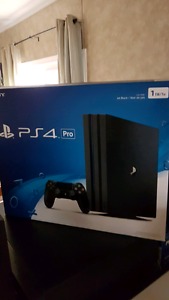 PS4 PRO AND 2 CONTROLLERS