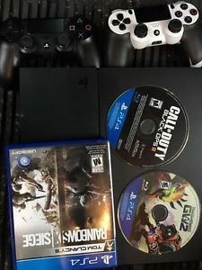 PS4+2x controllers+ CD games
