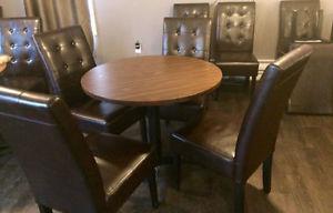 4 Leather Parsons Chairs and 36" round table