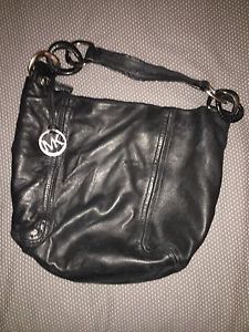 Black Leather purse by Micheal Kors