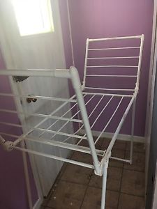 Indoor clothes drying rack