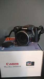 Needs gone! Canon PowerShot sx500 is w/ accessories