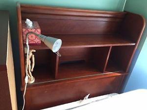 Twin bed with bookcase headboard