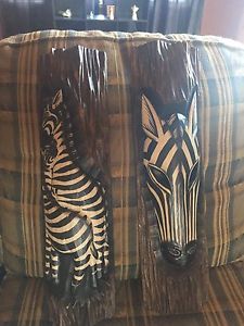 Wooden zebra heads
