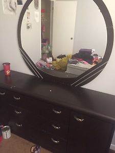 Dresser with a mirror