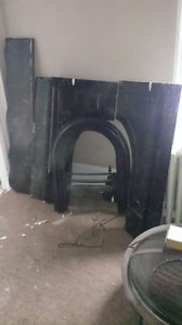 Faux marble fireplace mantel, facing and wrought iron