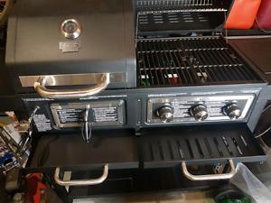 Brand new propane / charcoal bbq never used!!!