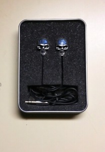 Brand new skull earphones+ still in metallic casing