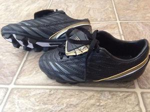 For sale kids WILSON soccer cleats- size Youth 11. Brand New