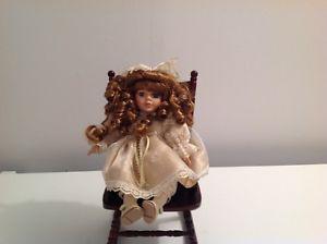 MUSICAL DOLL with WOODEN ROCKING CHAIR