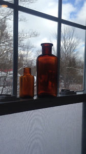 Two Antique Amber bottles