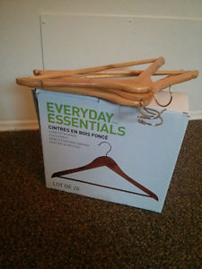 Box full of new wooden hangers