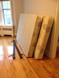 Double box spring, mattress and frame.