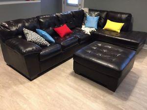 Large leather sectional with ottoman