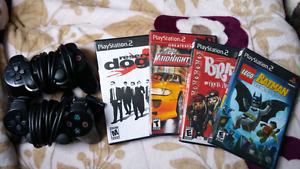 Ps2 games and 2 sony controllers